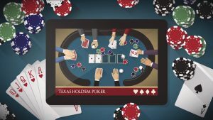 Tablet showing Texas Hold'em Poker sitting on a poker table with cards and chips.